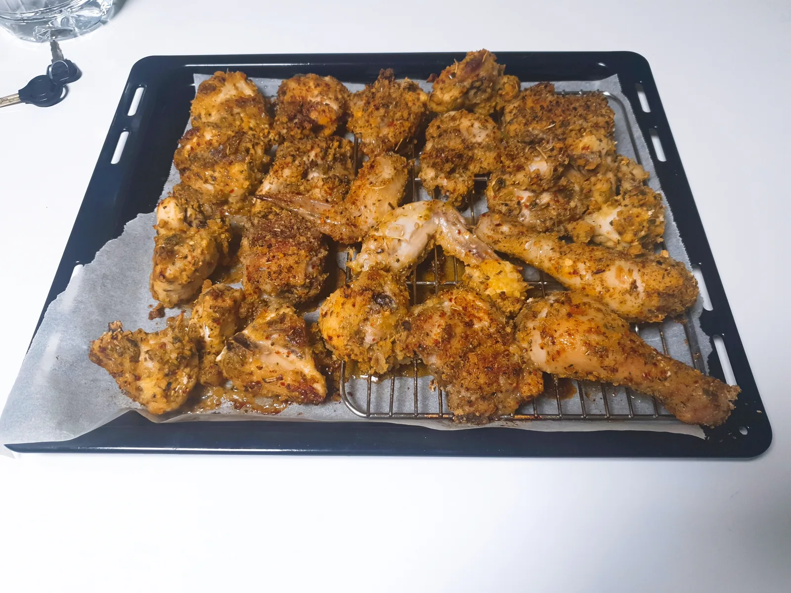 Chicken roasted on an oven tray