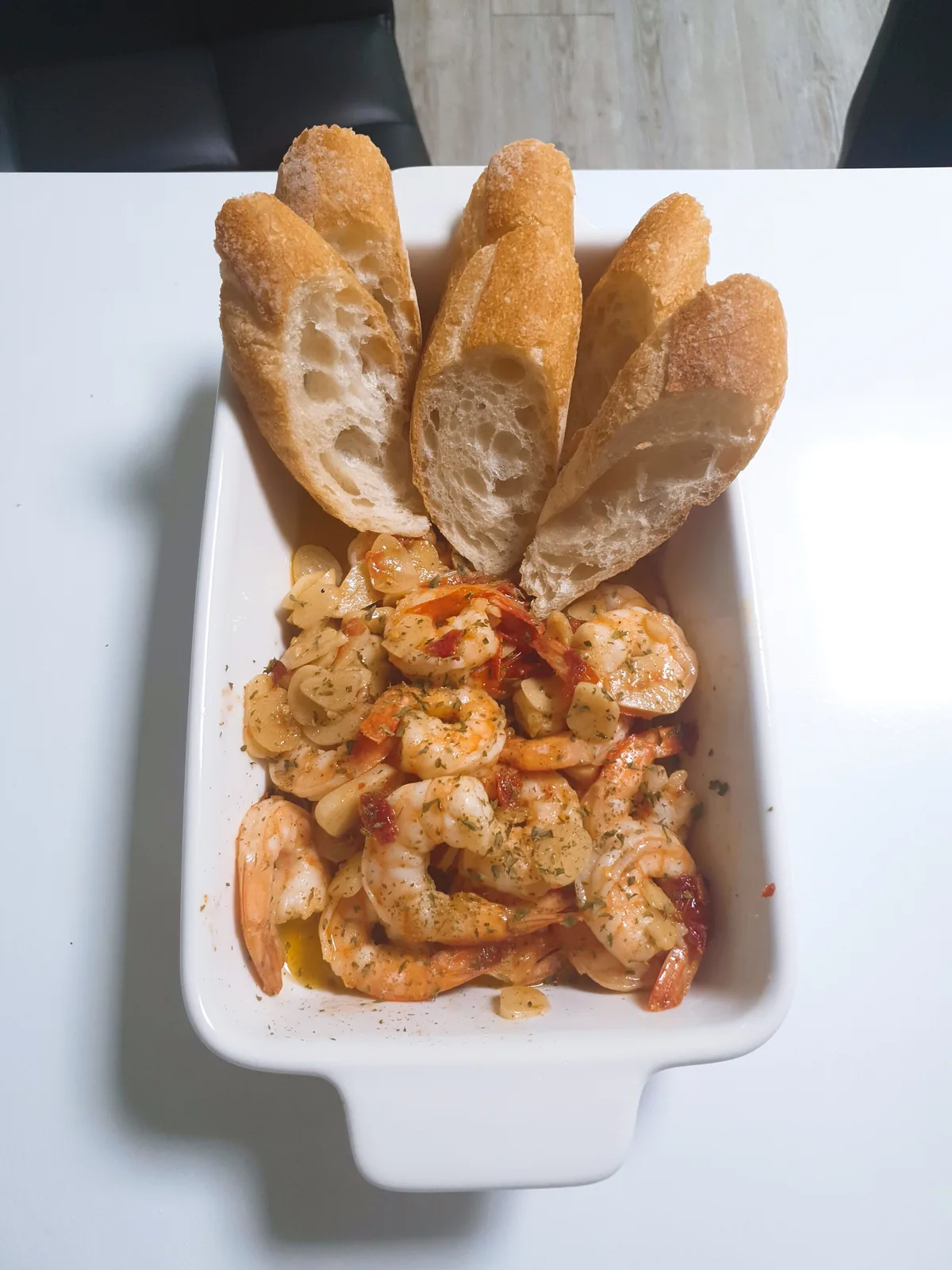Gambas al ajillo served with baguette