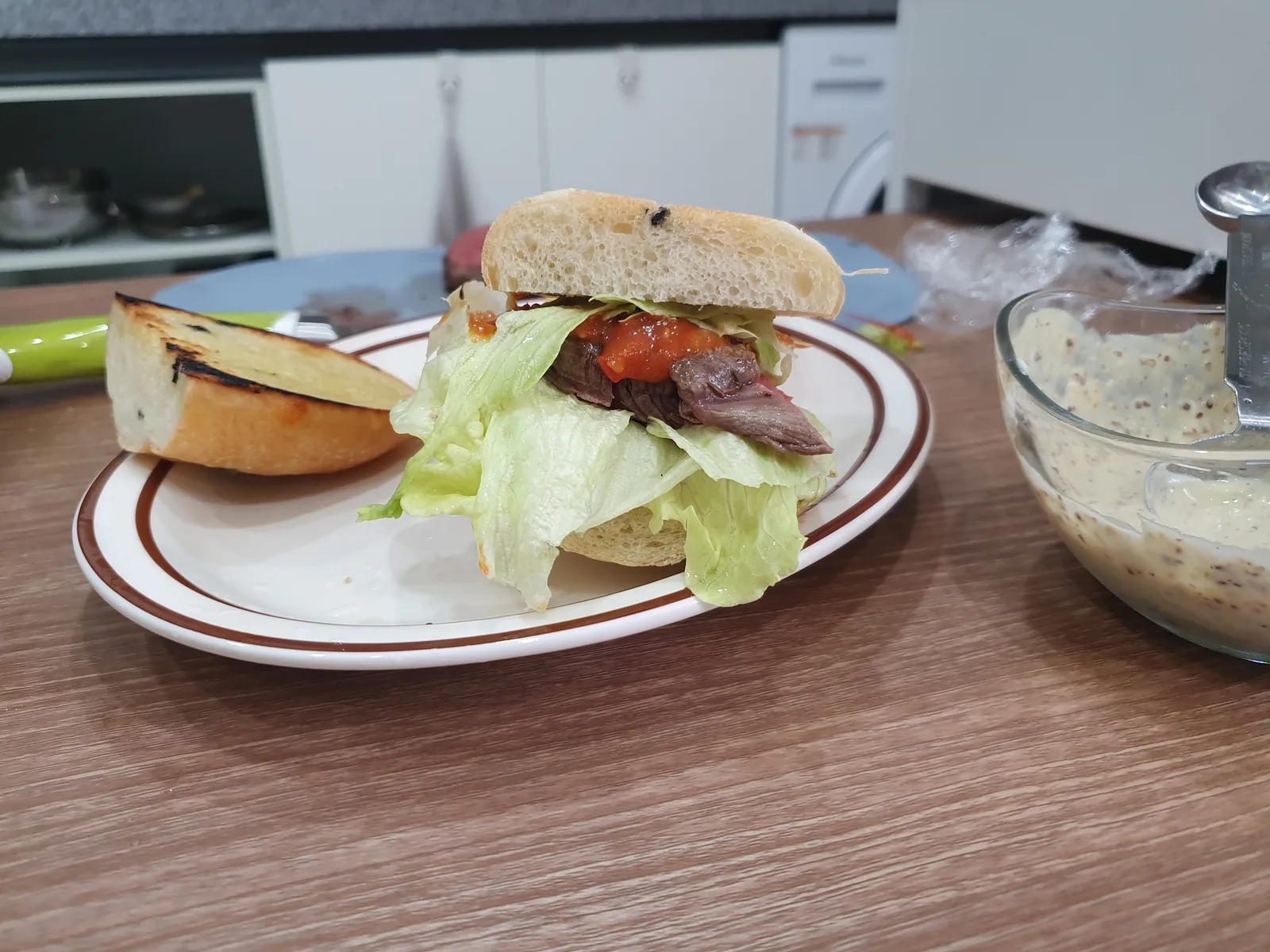 A plated steak sandwich
