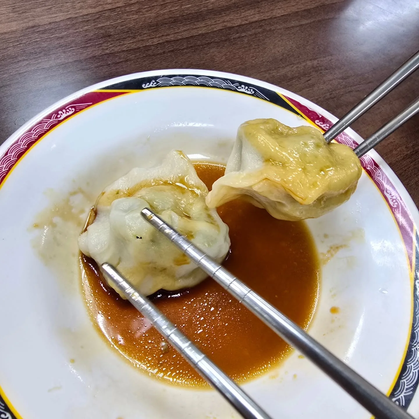 Dumplings served with sauce