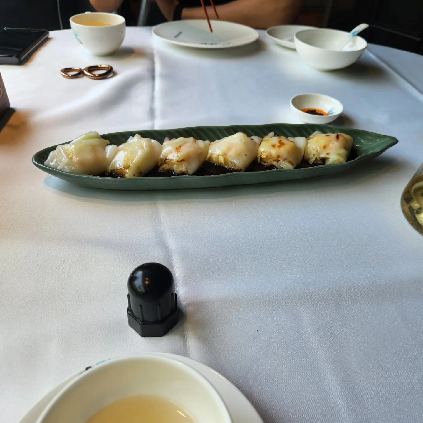 Assorted steamed dumplings on a long plate