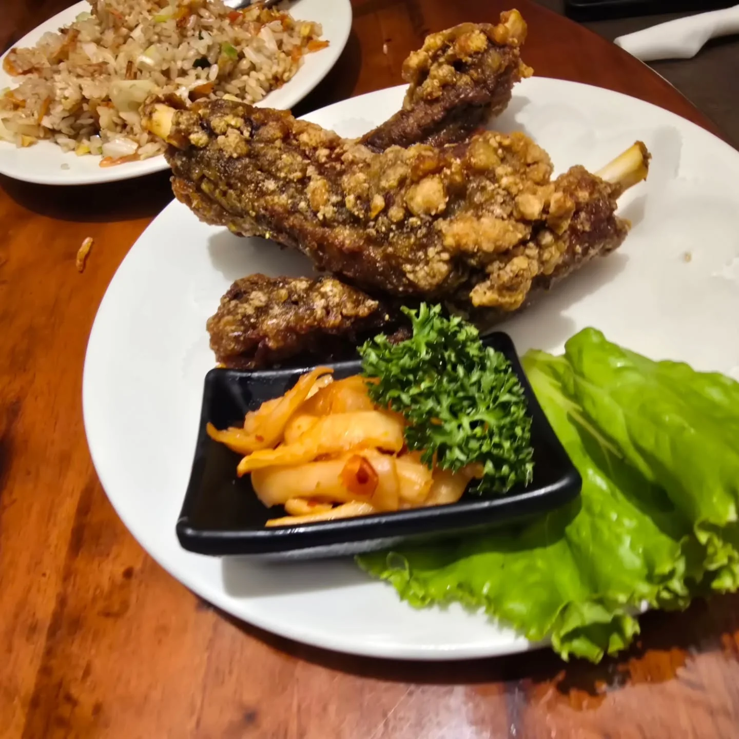 Fried pork ribs and side dishes at Xing Peng Lai